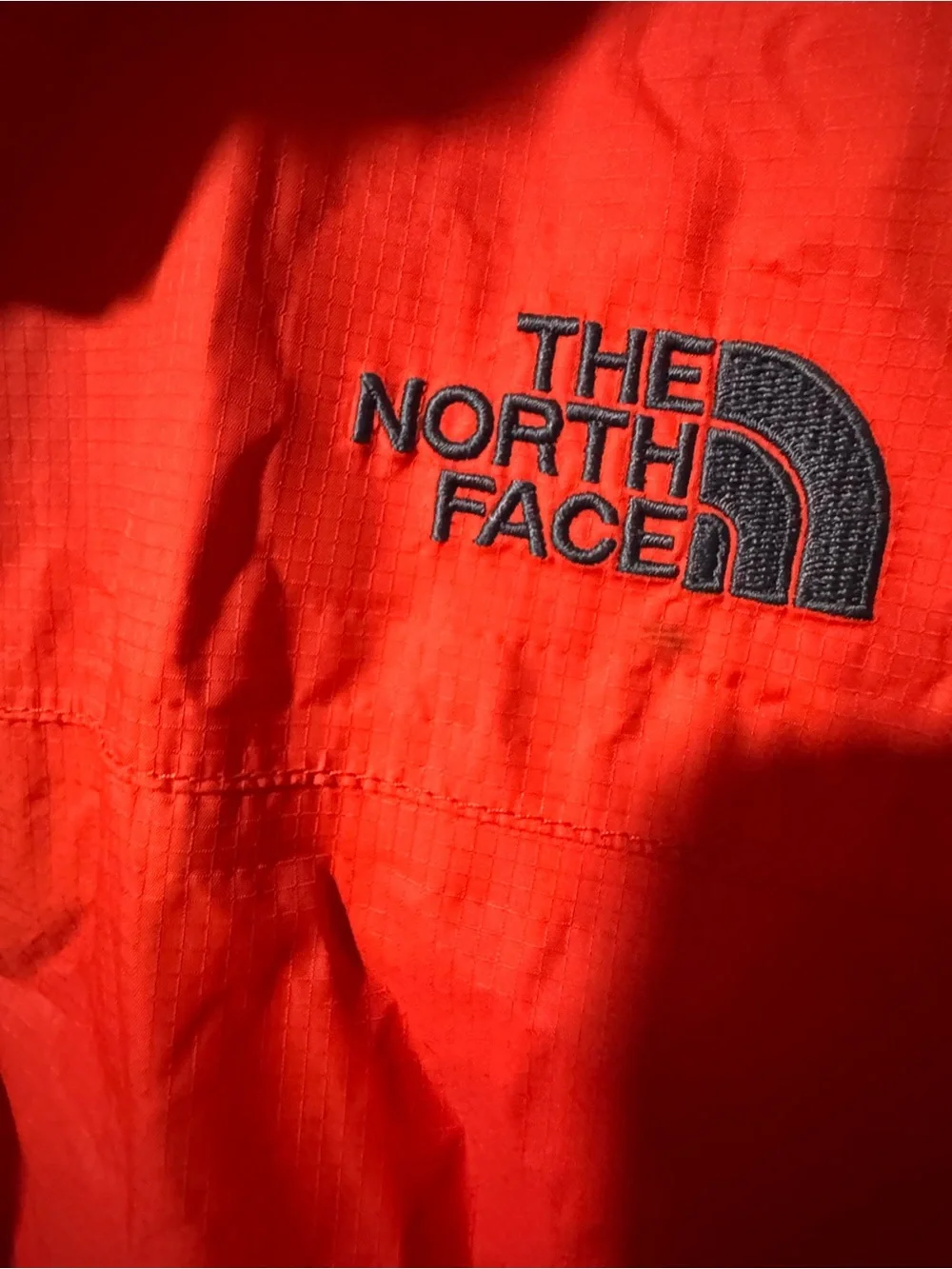 The North Face Men’s Orange Hooded Rain Jacket